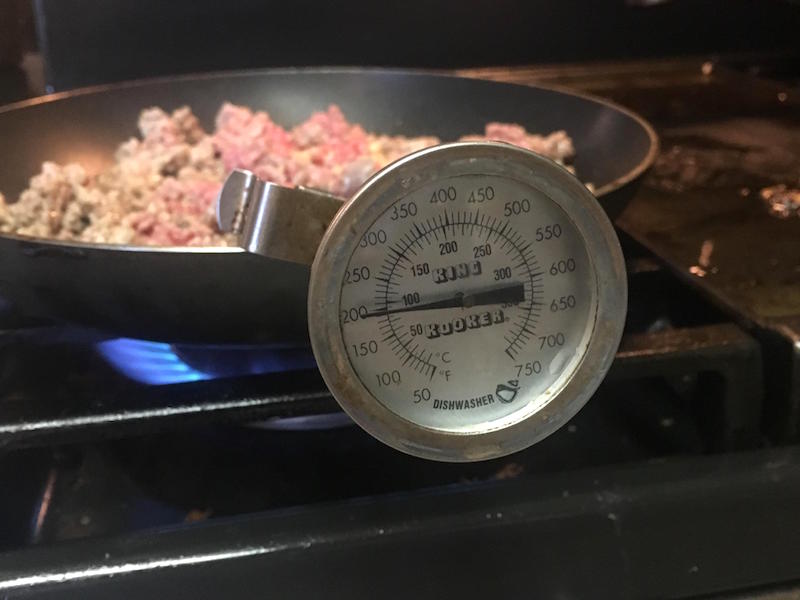 The only way to know that beef is truly cooked is by checking its temperature with a thermometer. The U.S. Department of Agriculture recommends cooking all whole-muscle cuts of beef to a minimum of 145 degrees Fahrenheit and all ground beef products and enhanced or blade-tenderized products to a minimum of 160 F.