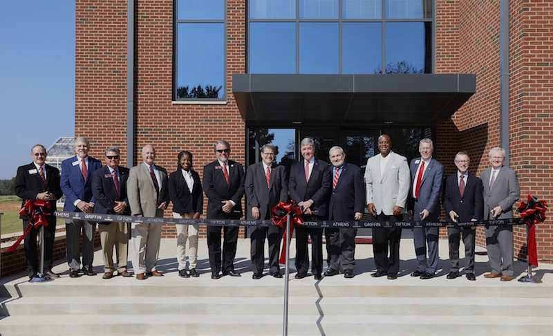 Local officials, regents and University of Georgia President Jere Morehead pose for a photo at the ribbon cutting of the new Turfgrass Research Building on the UGA Griffin campus.