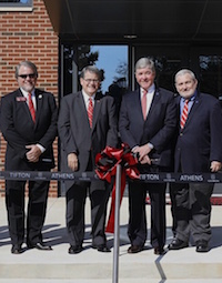 Local officials, regents and University of Georgia President Jere Morehead pose for a photo at the ribbon cutting of the new Turfgrass Research Building on the UGA Griffin campus.