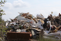 A large pile of household rubbish, including furniture, kitchen cabinets and sheetrock, awaits disposal after Hurricane Irma caused waist-high water to rise inside homes and buildings on Tybee Island, Georgia.