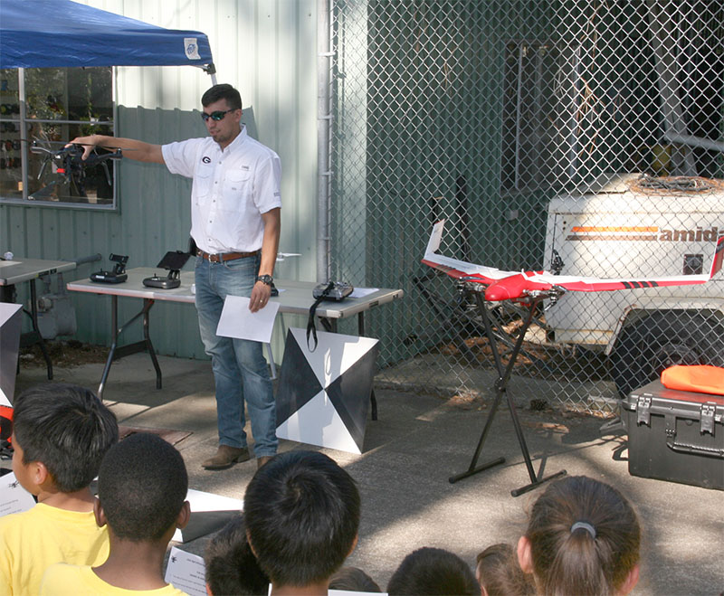 David Daughtry, University of Georgia Tifton campus graduate research assistant and licensed drone pilot, speaks to local elementary school students about agricultural uses for drones during the Agricultural and Environmental Awareness Day held in May 2017.