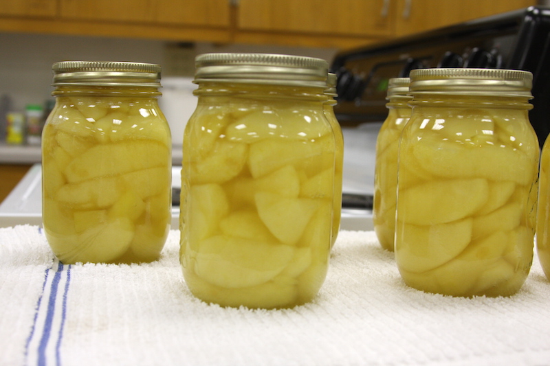 If you receive a gift of a homemade canned good, look closely before you consume it. Is the food covered with liquid with no discoloration or is it drying out at the top of the jar? The food should not be unnaturally discolored either. And, obviously, throw out anything with mold growing on it. And, before opening the jar, look for signs of spoilage, such as cloudy and/or bubbling liquid. Lastly, make sure the jar's vacuum seal is intact when you open the jar and no liquid is spurting out, an indication that pressure inside the jar is forcing it out. Also, notice if there are unusual odors coming from the food in the jar.