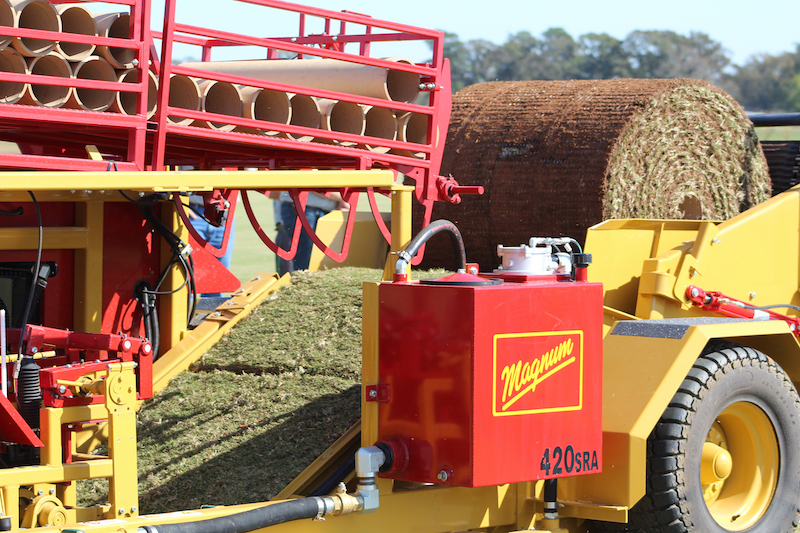 A survey of the state's sod inventory is conducted each year by University of Georgia Cooperative Extension and the Georgia Urban Ag Council. Each year, Georgia sod producers and other members of the industry, including equipment manufacturers, gather for the annual Sod Field Day. This photo shows a sod harvester being demonstrated.