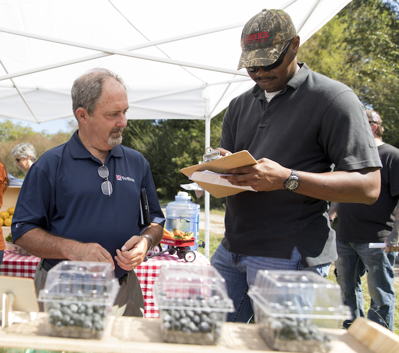 Chuck Pugh of Cane Creek Farm in Cumming, Georgia, and Joshua Marshall of Lyons, Georgia, are among the military veterans who have participated in the University of Georgia's FarmAgain Program.