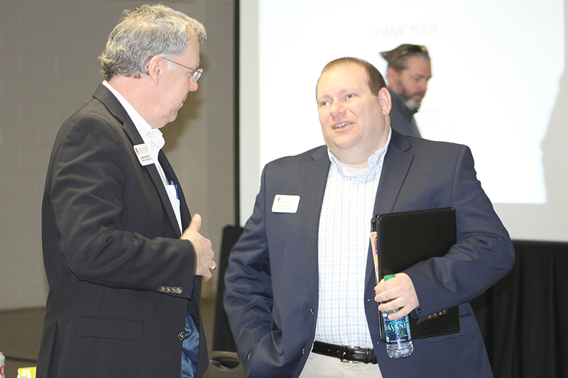 CAES Dean Sam Pardue chats with peanut economist Adam Rabinowitz following the Ag Forecast in Lyons, Georgia, on Jan. 30, 2018.