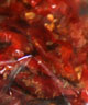 Mock "sun-dried" tomatoes can be made indoors using a food dehydrator. Georgia's humid climate makes creating true sun-dried tomatoes near impossible.