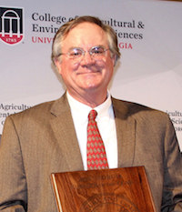 James Vaughn was named the 2018 Georgia Farmer of the Year during a ceremony held at the Georgia Freight Depot in Atlanta on Tuesday, March 20.  Pictured left to right are University of Georgia College of Agricultural and Environmental Sciences Dean Sam Pardue, Georgia Commissioner of Agriculture Gary Black, Vaughn and Georgia Governor Nathan Deal.