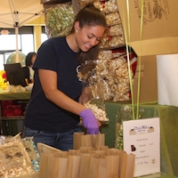 A food product entrepreneur serves up samples at a local grocery store. 
University of Georgia Cooperative Extension is partnering with Fort Valley State University to host a small business workshop on June 19.