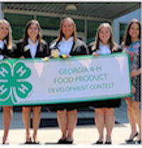 Walker County 4-H members (from left) Jenna Sweatmon, Lauren Pike, Tori Lawrence, Rylie Chamlee and 4-H agent and team coach Casey Hobbs celebrate after pitching their Cheez Beez snack cracker concept at the 2018 Georgia 4-H Food Product Development Contest.