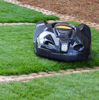 University of Georgia Cooperative Extension Turfgrass Specialist Clint Waltz is currently using an “automower” on the lawn just outside the new UGA Turfgrass Research Facility on the UGA Griffin campus. The Husqvarna mower is on loan from Georgia sod producer Super-Sod, so Waltz can observe and evaluate the concept of “continual” mowing.