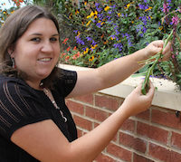 University of Georgia College of Agricultural and Environmental Sciences graduate Bethany Harris of Griffin has earned a bachelor's and a master's degree from UGA Griffin. She is currently working on her doctorate. The new Double Dawg program allows students to earn bachelor's and master's degrees in less time, allowing them to enter the workforce sooner.
