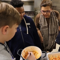 Georgia 4-H Club members Beau Gabriel, from left, Vatavion Faust and Davison Willis make ziti as part of Oglethorpe County 4-H Club's Cooking to Share program with adult volunteer Jane Eason.