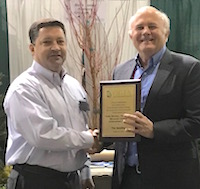 University of Georgia Horticulture Professor Tim Smalley has received the Georgia Green Industry Association's Vivian Munday/Buck Jones Memorial Lifetime Achievement Award, the association’s most prestigious honor. The award is presented when there is an individual deserving of recognition for a lifetime of accomplishment and contributions to the Green Industry. Smalley is shown (right) with GGIA Executive Director Chris Butts.