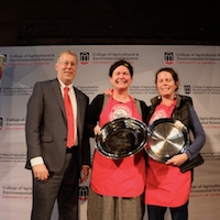 College of Agricultural and Environmental Sciences Dean Sam Pardue congratulates Suzy Sheffield of Atlanta's Beautiful Briny Sea and Holly Hollifield on their grand prize win at Flavor of Georgia 2019.
