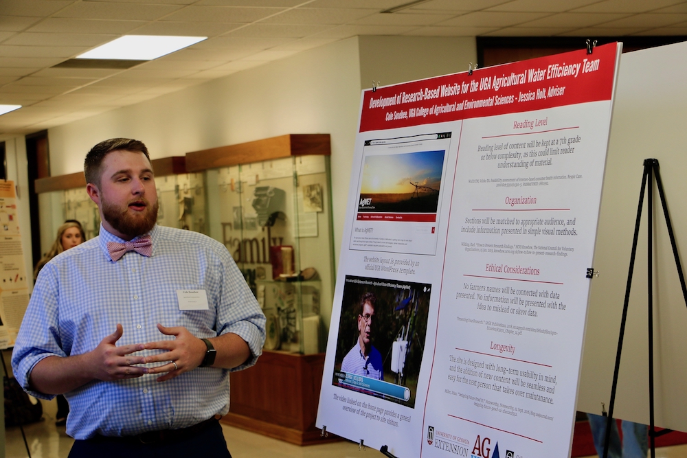 Cole Sosebee, a fourth-year student in the Department of Agricultural Leadership, Education and Communication, presents his research poster at the 2019 College of Agricultural and Environmental Sciences Undergraduate Research Symposium.