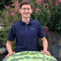 Jordan Smothers of Walton County won the 2019 Georgia 4-H Watermelon Growing Contest with his 135-pound watermelon. Amy Miller, far left, and Laicee Schell, both of Jeff Davis County, won second and third places with their 93- and 78-pound melons.