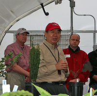 UGA horticulture Professor Donglin Zhang shows a group around his greenhouse at the Durham Horticulture Farm in Watkinsville during a past farm tour. The 2019 Horticulture Farm Tour will be held on Oct. 4 at 1221 Hog Mountain Road.