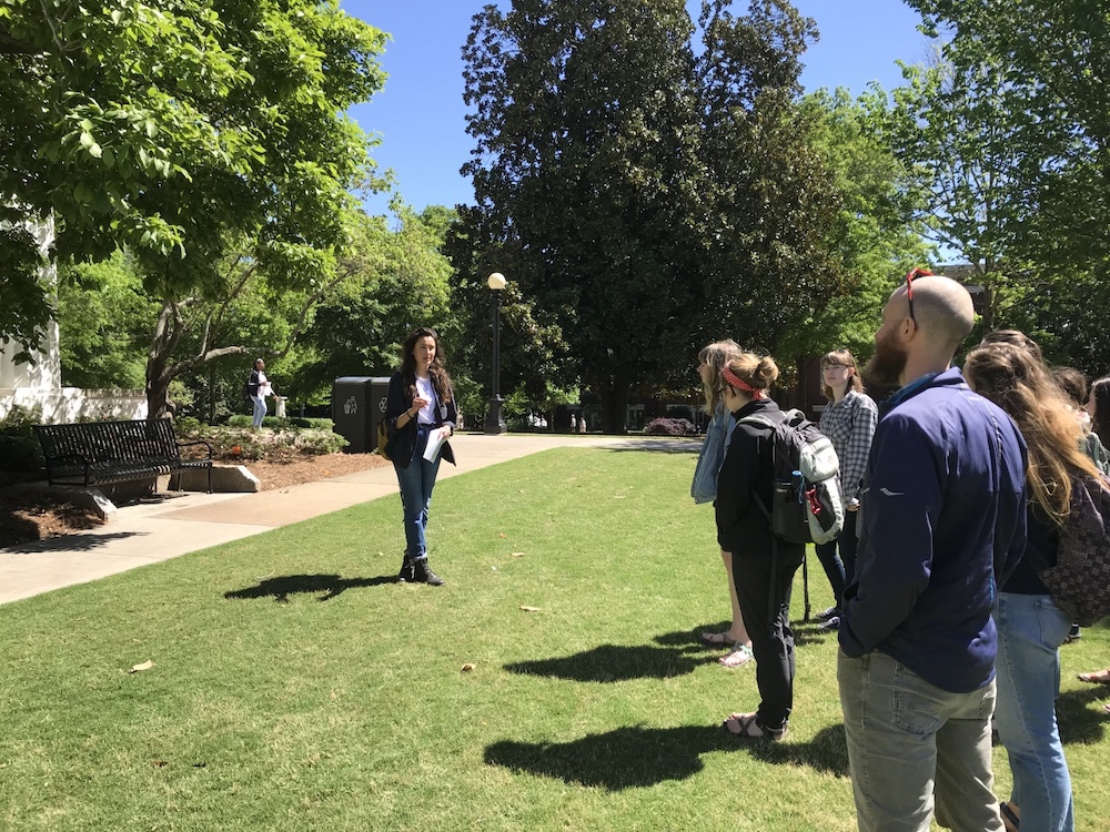 Kendall Busher, a CAES horticulture student at the UGA College of Agricultural and Environmental Sciences, leads a tour of the UGA Campus Arboretum, which is spread across campus. Busher created a web-based walking tour of the arboretum for the UGA Office of Sustainability.