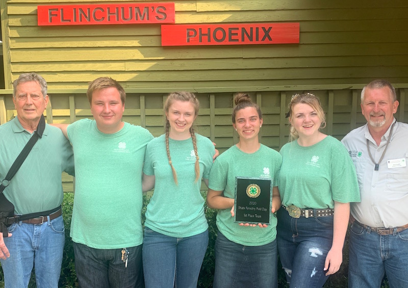 The Coweta County team won first place in the Georgia 4-H 2019 State Forestry Field Day. First Place Senior Team Winners will represent Georgia at the National 4-H Forestry Invitational in August, 2020. The Coweta County team are (pictured left to right) 
Coach Don Morris, Michael Whitlock, Jennifer Brinton, Alexa Hillebrand, Bella Fisk and Coach Buzz Glover.