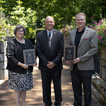 UGA Department of Poultry Science Professor Jeanna L. Wilson (left) and Professor and Department Head Todd Applegate (right) receive their Fellow awards from Poultry Science Association President Don McIntyre.
