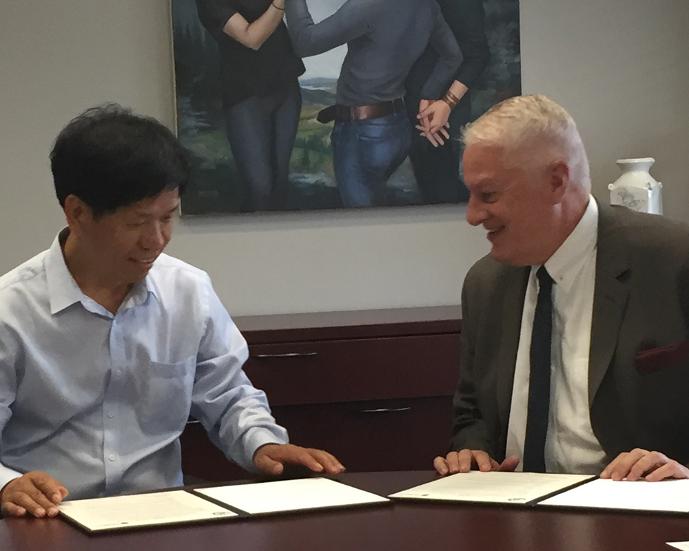 UGA Animal and Dairy Science Department Head Francis L. Fluharty (right) and Dengpan Bu, professor of animal nutrition in the Institute of Animal Science of the Chinese Academy of Agricultural Sciences, met to discuss ideas for collaboration and sign an MOU two years ago. The departments hope to expand the relationship to include undergraduate and graduate student exchanges. (file photo)