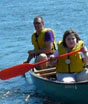 A group of students enjoys canoeing on the lake at Rock Eagle 4-H Center in Eatonton, Ga.