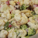 Broccoli and Cauliflower Salad
Dressing: 1 cup light mayonnaise; 1/4 cup cider vinegar; 2 tablespoons Splenda; 1/2 teaspoon pepper. 
Salad: 4 cups cauliflower separated into small florets; 6 cups broccoli; 1/2 cup chopped red onion; 1/2 cup slivered almonds; 1/2 cup raisins. 
Add dressing ingredients in a jar with a tight-fitting lid. Shake to mix. Pour over combined salad ingredients. Toss well. Chill before serving.