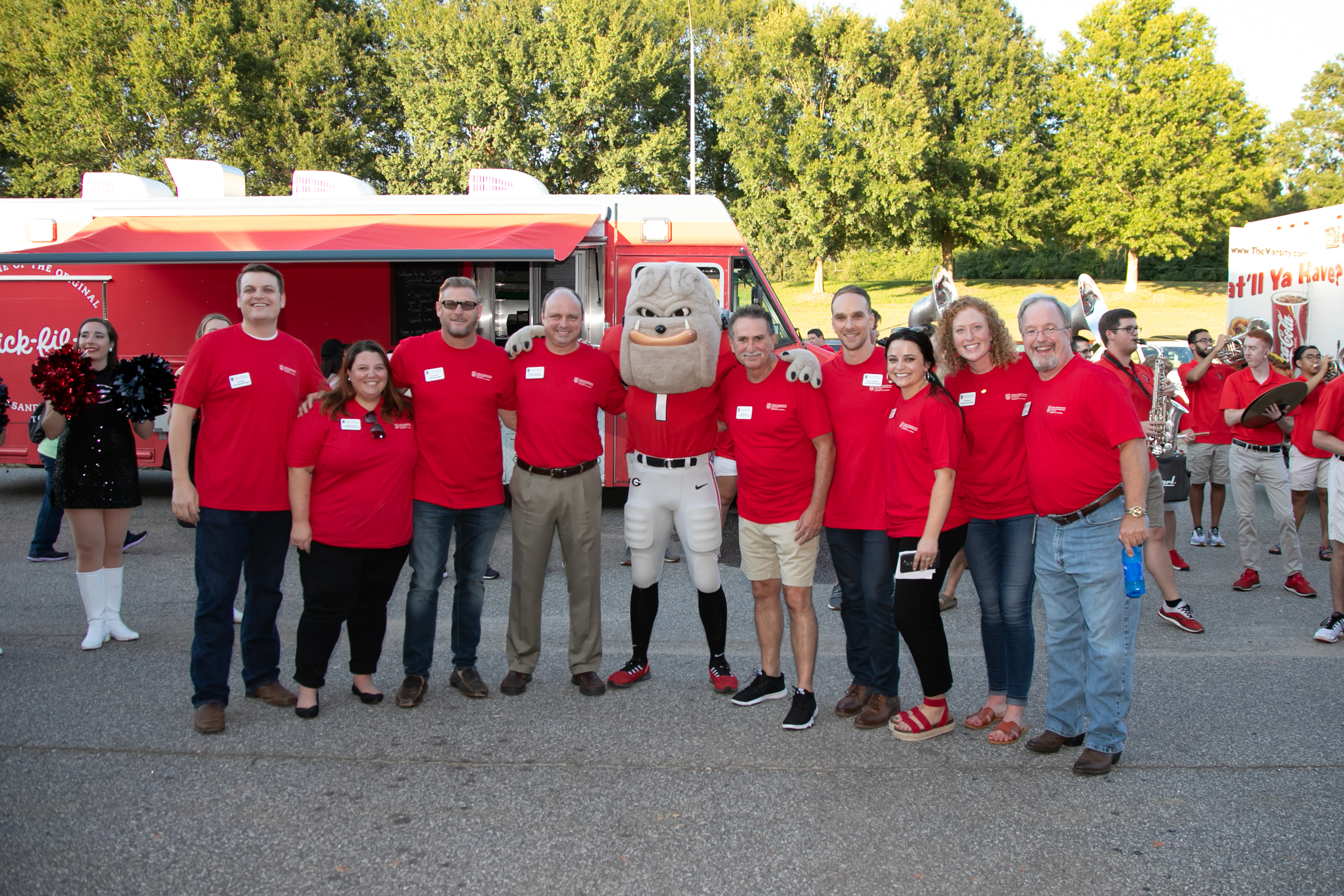 The CAES Alumni Association poses with UGA mascot Hairy Dawg.