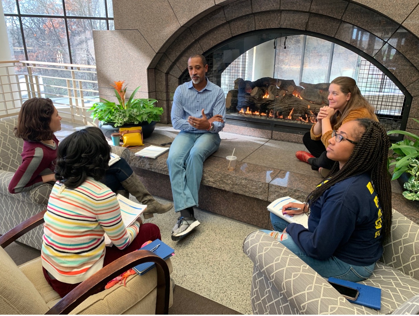 Group of fellows have a roundtable conversation as part of the IAspire Leadership Academy.