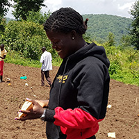 Tabitha Lomotey studies peanut resilience to certain fungal diseases, but she also discovered that some varieties grow well in the middle altitudes of Uganda, giving farmers a potential new crop.