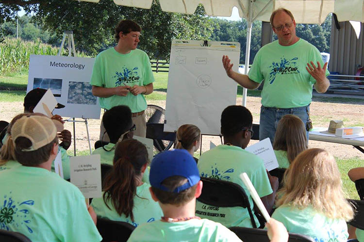 4-H educators lead a class on meteorology during the Mitchell County 4-H2O camp in 2019.