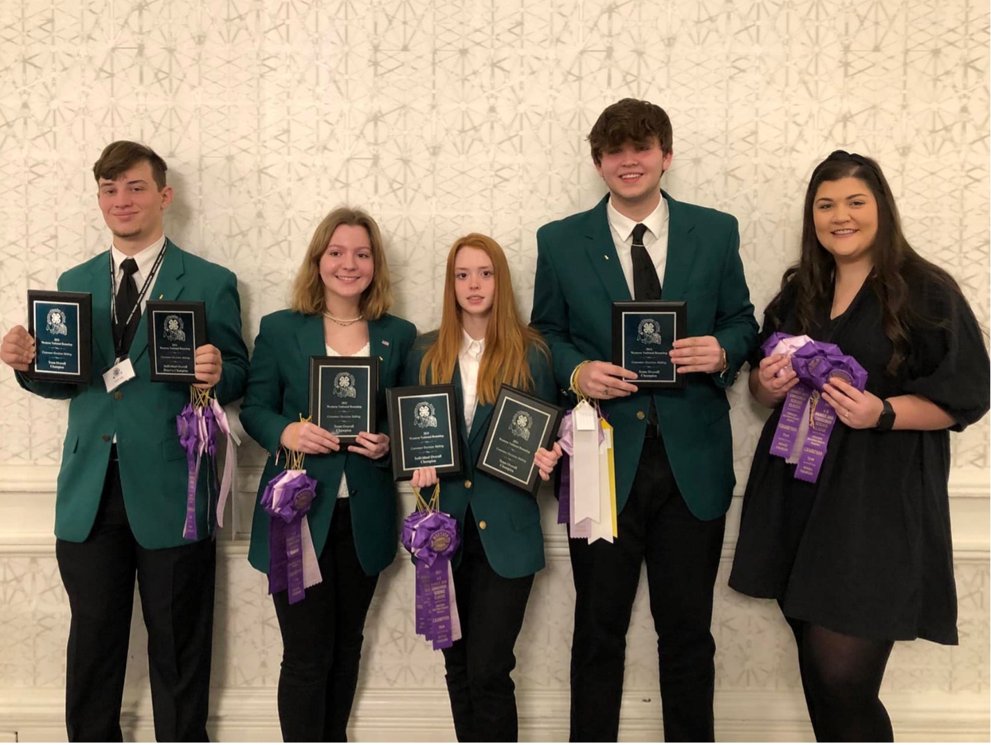 Ben Hill County swept the National Consumer Decision Making contest in Denver, Colorado. Team members (left to right) Liam Jay, Ashley Braddy, Lauren Wixson and Timothy Lord display their awards with coach Laura Lee Williams, Ben Hill County Extension 4-H Agent.