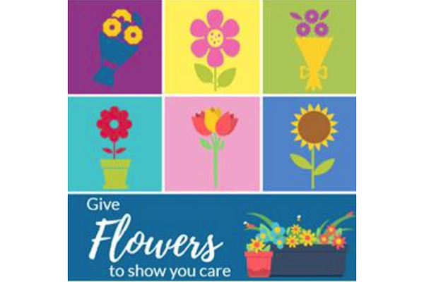 An ad showing several types of flowers, with wording that says Give flowers to show you care.