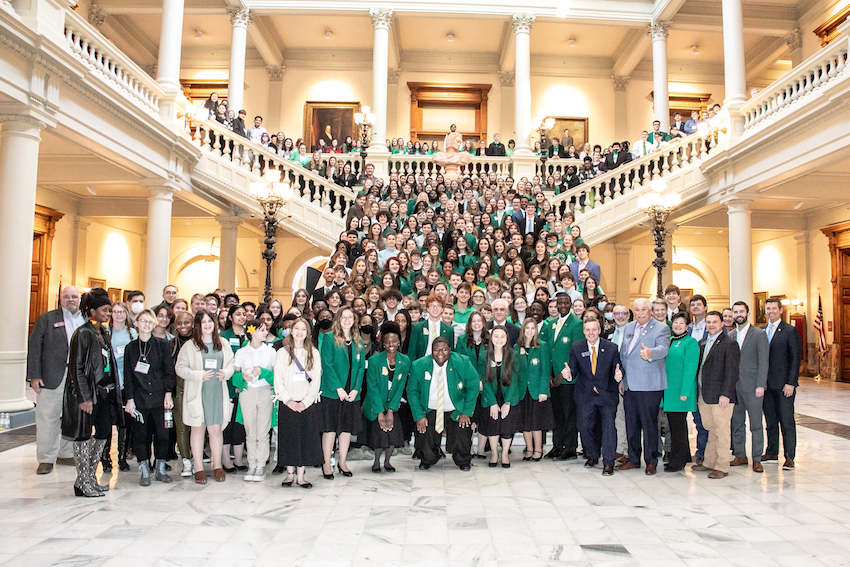 Georgia 4-H’ers gather on the Oglethorpe Staircase in the Georgia Capitol Building with legislators and organizational leaders to celebrate Georgia 4-H Day at the Capitol on February 9.