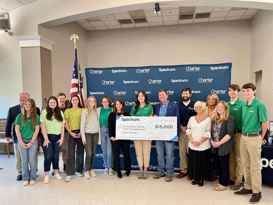 Catoosa County officials, 4-H Extension staff, 4-H student leaders and Charter Communications representatives celebrate a $15,000 Spectrum Digital Education grant in support of the 4-H Tech Changemakers program.