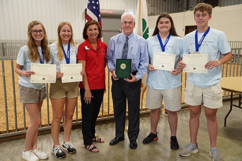 First-place winners from Oconee County 4-H receive their awards at the state Poultry Judging contest in Oglethorpe County. From left, Blakely Steward, Lexi Pritchard, Associate 4-H Leader Sue Chapman, State 4-H Leader Arch Smith, Connor Watson and Thomas Stewart show off their newly won certificates.