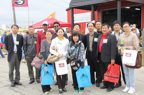 Scientists from China and Taiwan visit with CAES researchers at the 2011 Ag Expo in Moultrie.