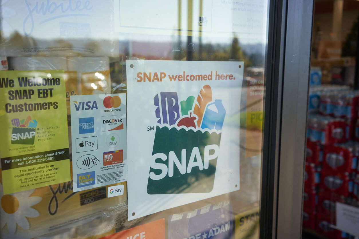 "SNAP welcomed here" sign is seen at the entrance to a Big Lots store in Portland, Oregon. The Supplemental Nutrition Assistance Program (SNAP) is a federal program.