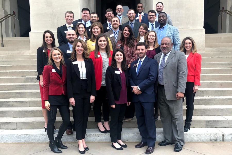 The AGL cohort of 2019-2021 gather during their federal policy institute on the front steps of a columned building in Washington, D.C.