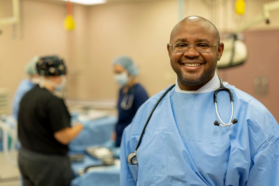 Environmental portrait of professor Franklin West in the surgery suite of the Edgar Rhodes Center for Animal and Dairy Science.