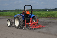This flex tine tractor was the key to the natural weed control used in organic peanut production research in Tifton.