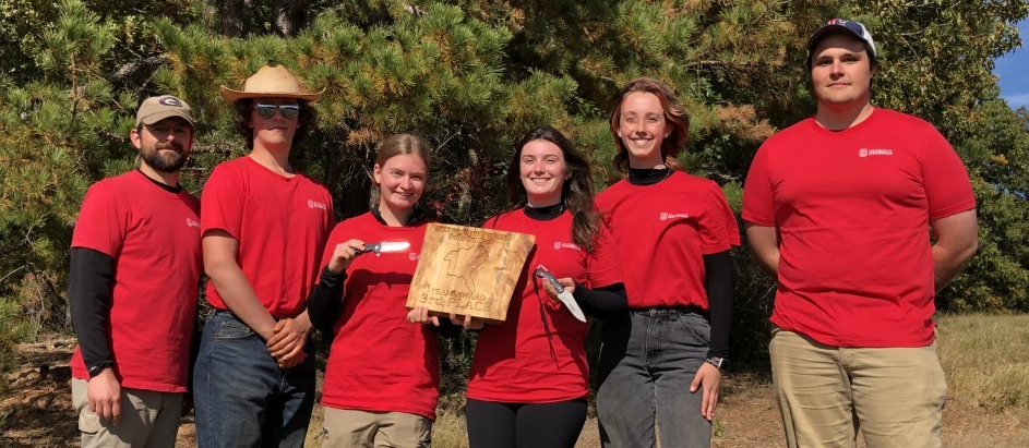 The University of Georgia soil judging team poses with some of their awards from the regional competition