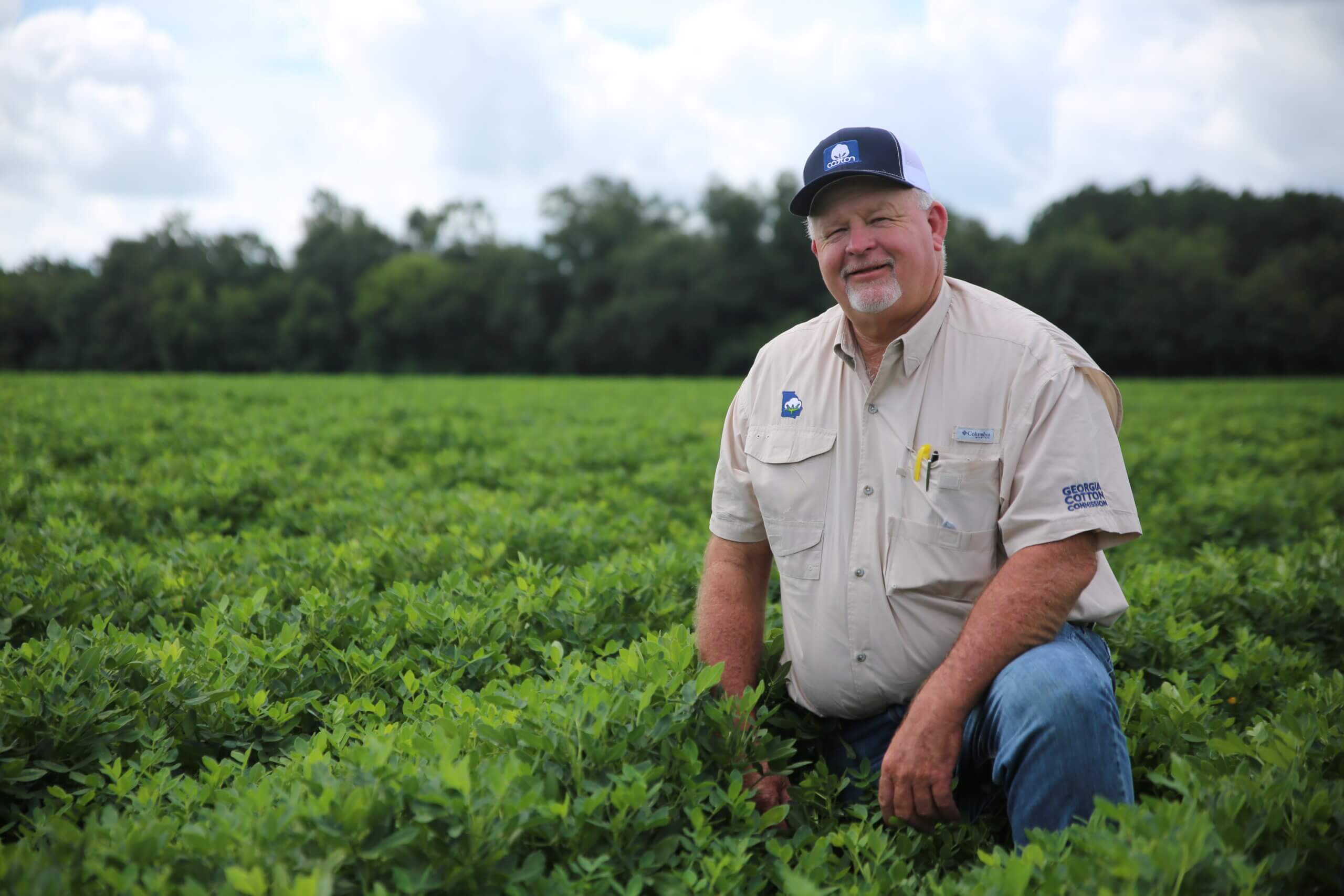 Bart Davis, wearing Georgia Cotton Commission gear, smiles from his crop rows on Davis Family Farms.