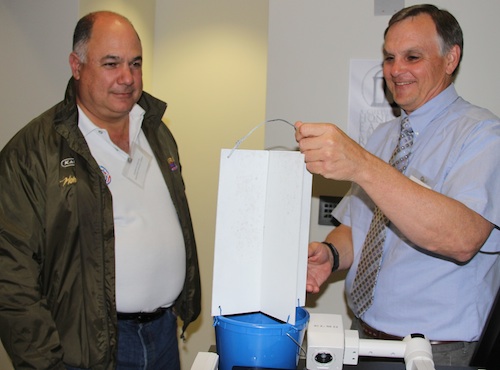 Guillermo Alvarado, executive director of the International Regional Organization of Plant and Animal Health, (left) and Jim Hanula, entomologist with the USDA-Forest Service.