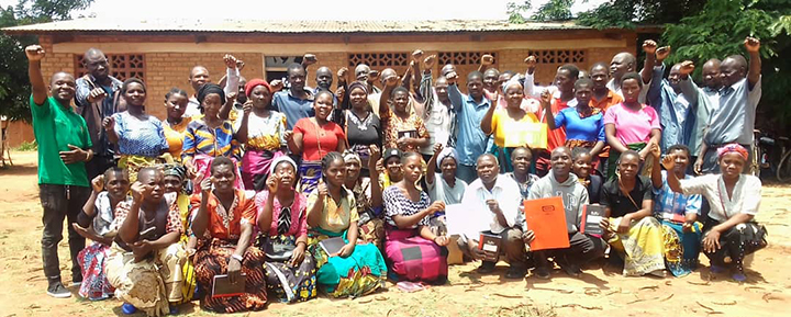 Farmers pose after receiving training