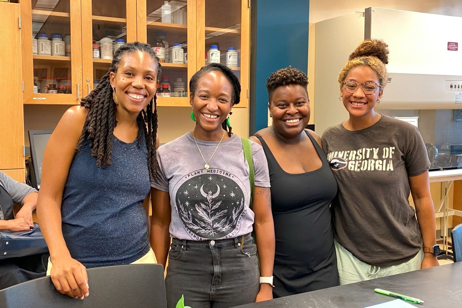 UGA students gather with the presenter of the Black Women and Herbalism Workshop hosted by Spelman's Food Studies Program.