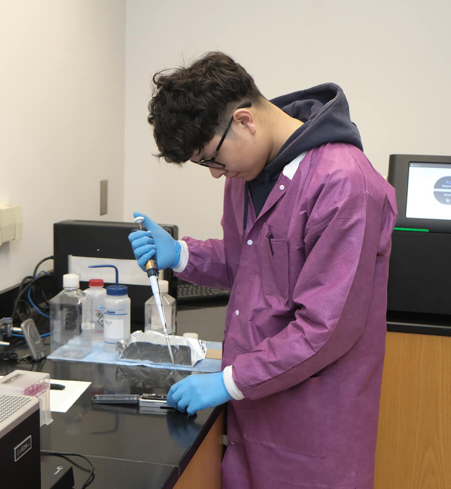 Zhihan Xian works in a lab on the UGA Griffin campus