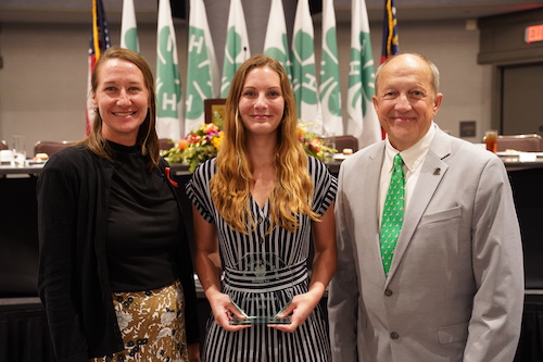 Melanie Biersmith (left) congratulates Ryles Rising Star Award winner Rachel Frisbie (center) with former Georgia 4-H State Leader Bo Ryles, for whom the award is named.