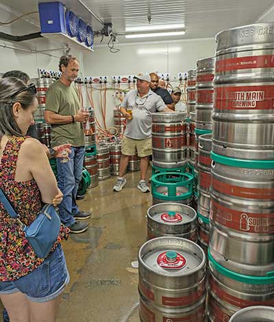 UGA Extension brewing workshop attendees get a tour of the keg room at South Main Brewing. 