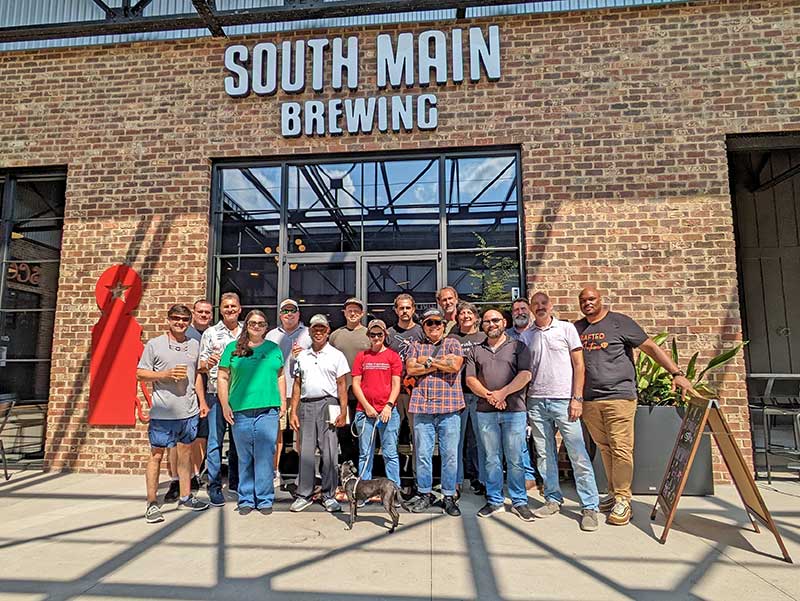 A group of business-minded craft brewers attended a three-day brewing workshop that incorporated visits to local breweries, including South Main Brewing,led by University of Georgia Cooperative Extension Food Science and Technology (EFST) process specialist Kaitlyn Casulli (center front in red shirt) in August. 